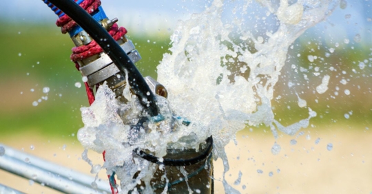 Pumping air from compressor into from new constructed water bore or well as process of cleaning and filtrating water